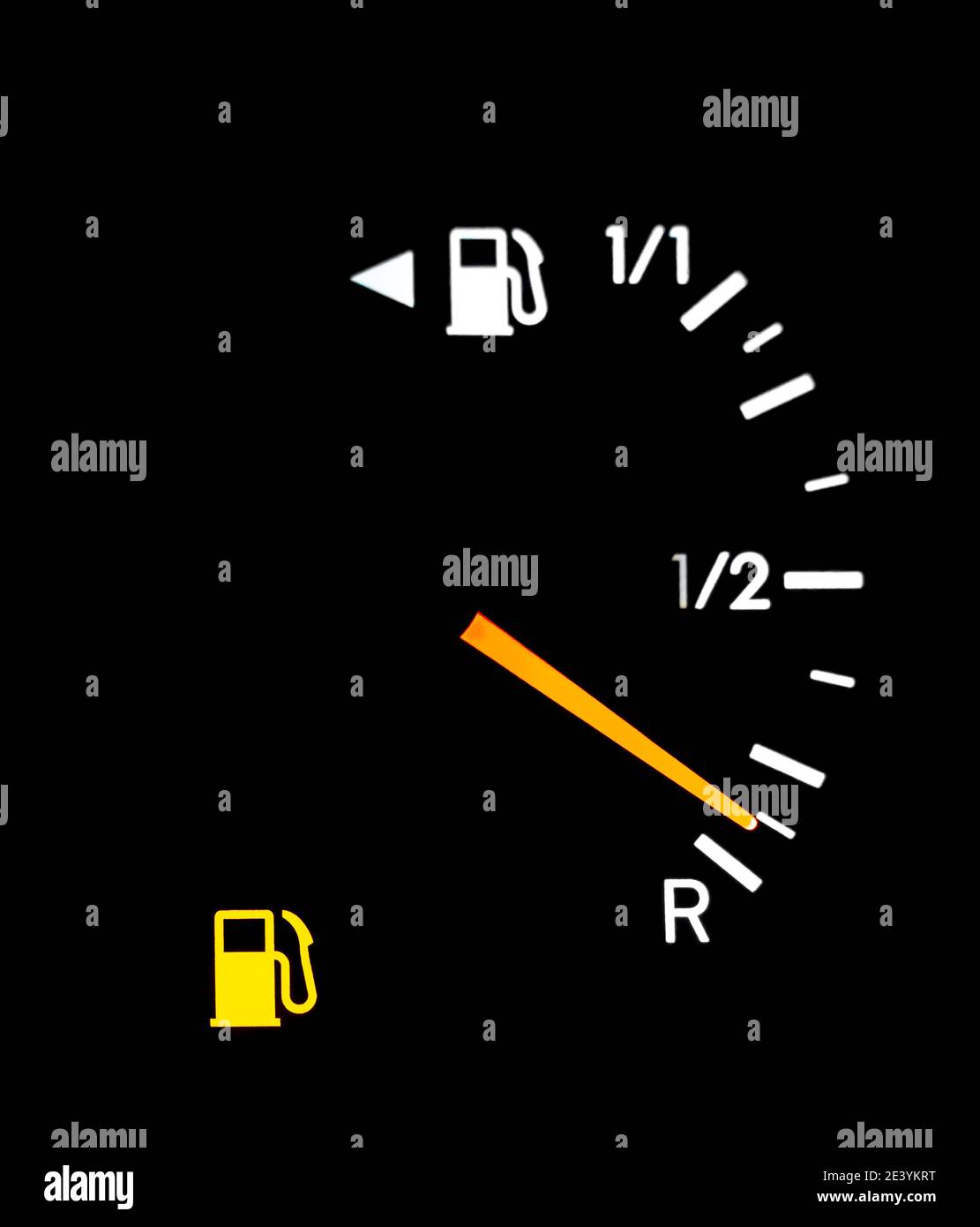 Fuel indicator on a cars dashboard showing no gas in tank. Stock Photo
