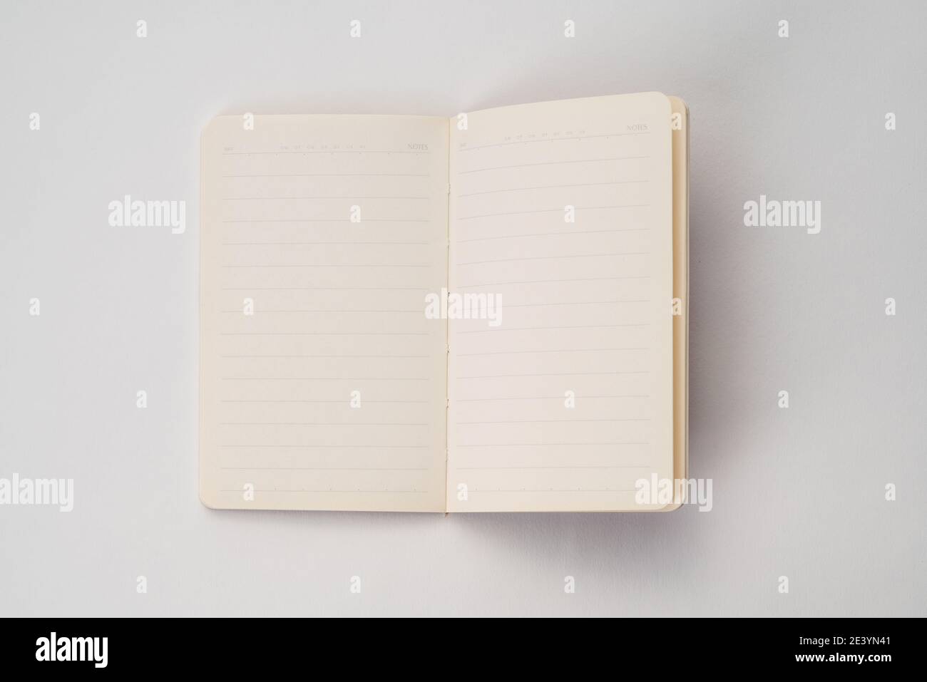 Topview of notebook with isolated background Stock Photo - Alamy