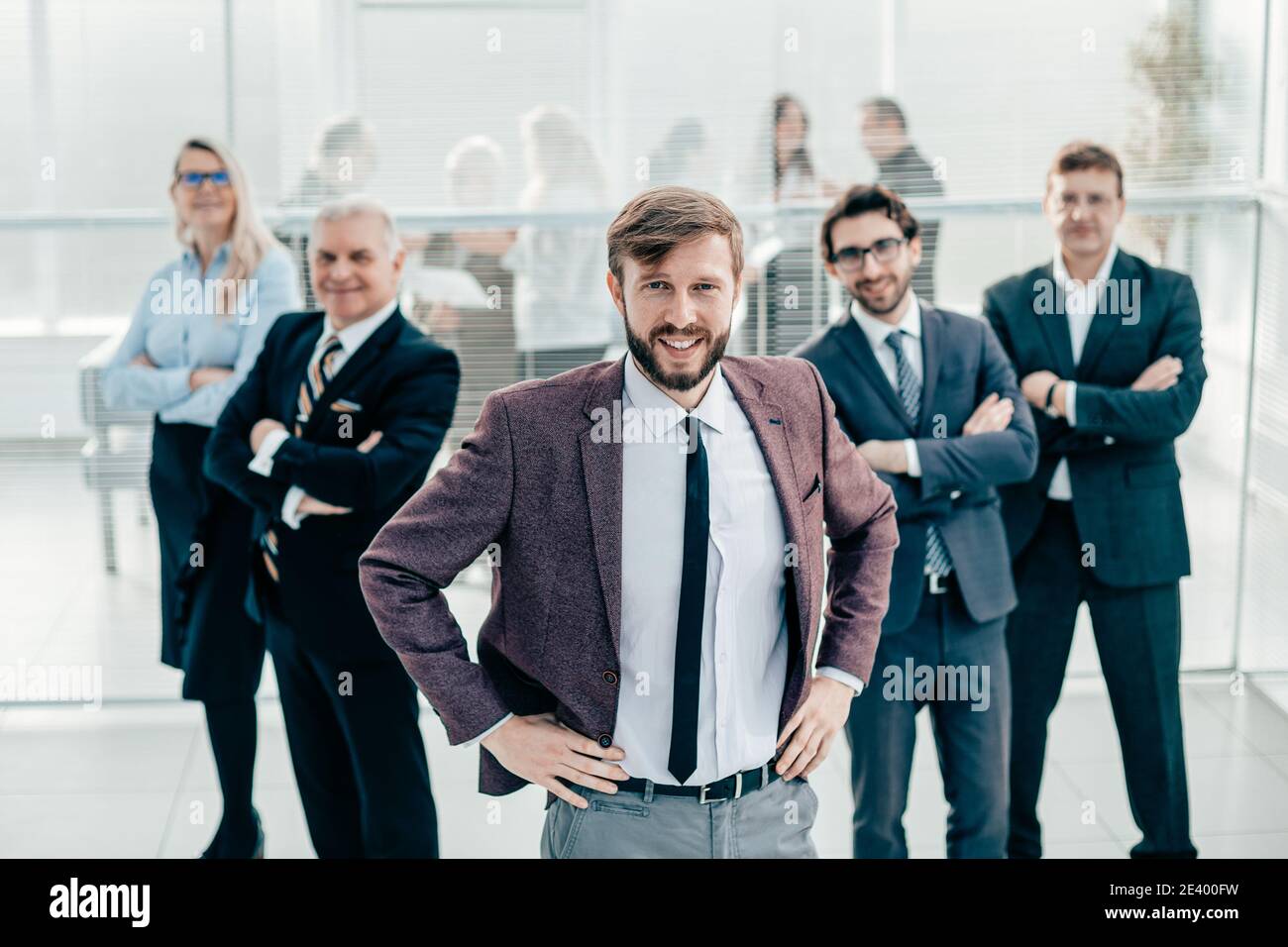 group of diverse business people standing in the office Stock Photo - Alamy