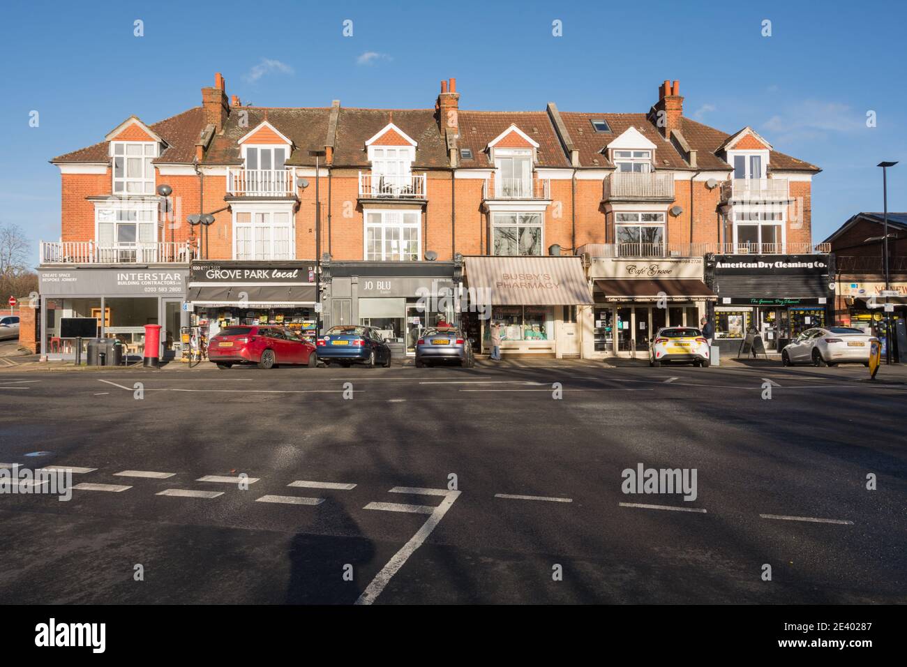 A parade of shops on Grove Park Road, Chiswick, London, W4, U.K Stock