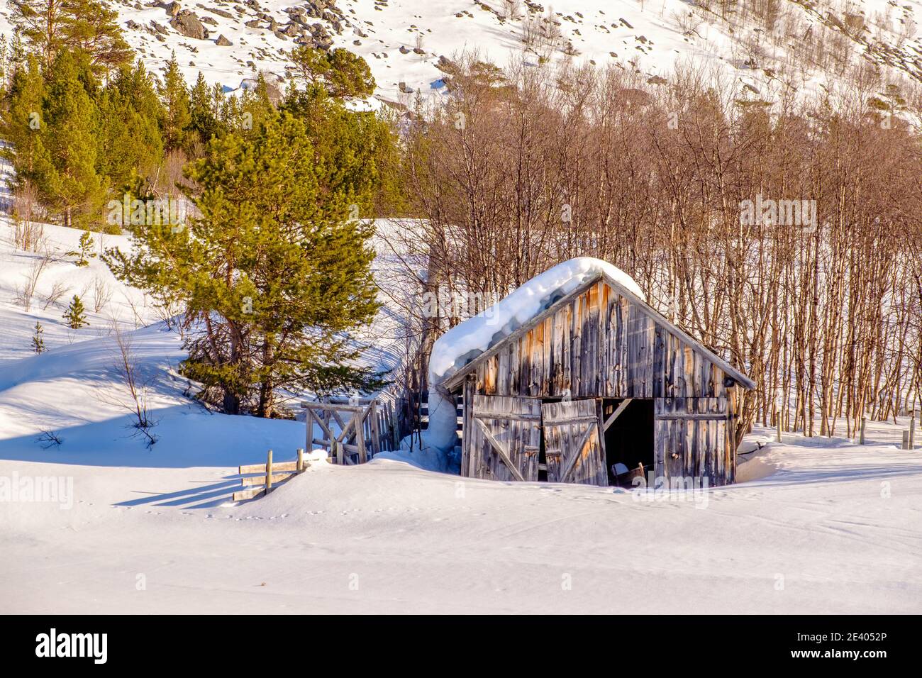 Old wooden farm building in Norway Stock Photo