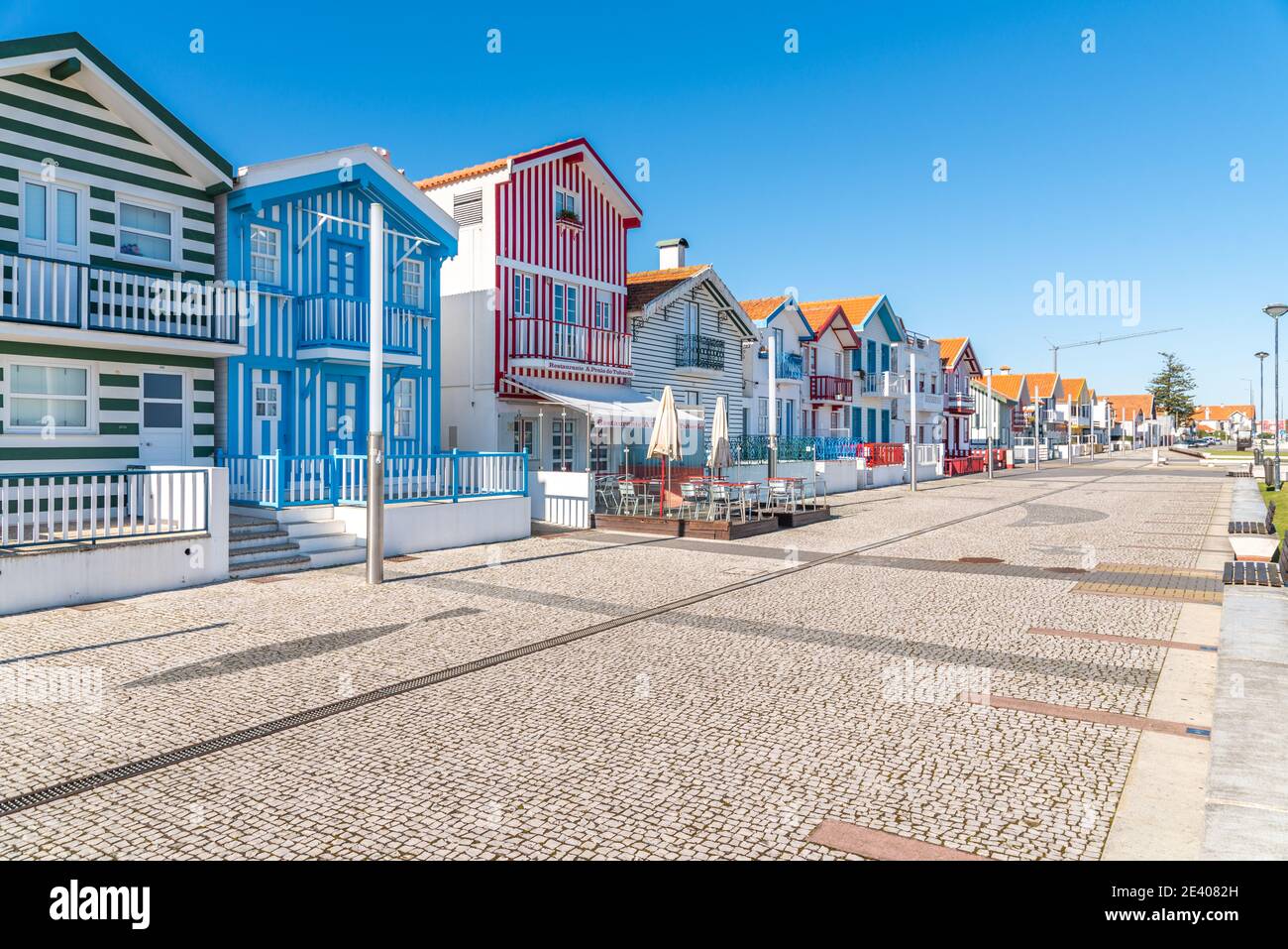 colorful image Typical stripes Houses in Costa Nova, Aveiro, Barra, Portugal Stock Photo