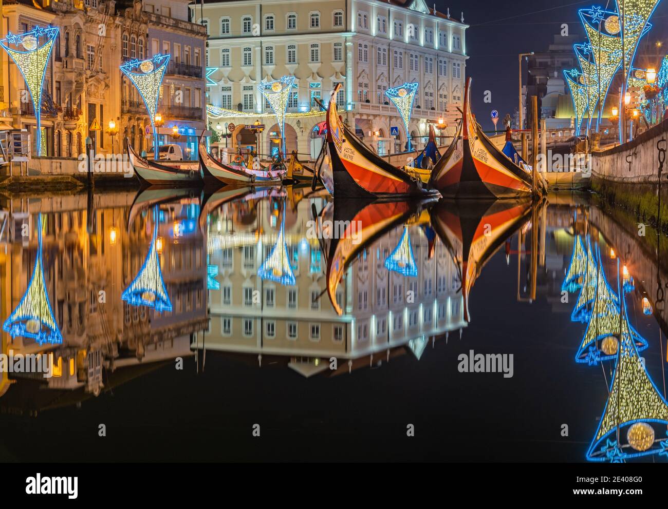 color image of the river with Moliceiro boats on the lagoon at night, northern, Aveiro, Portugal January 2021 Stock Photo
