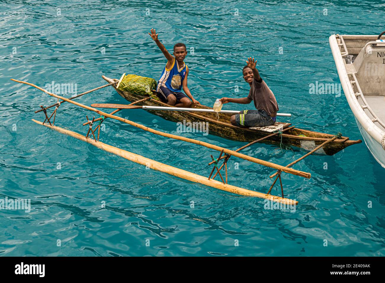 Outrigger Canoe in front of the True North at Panasia Island, Papua New