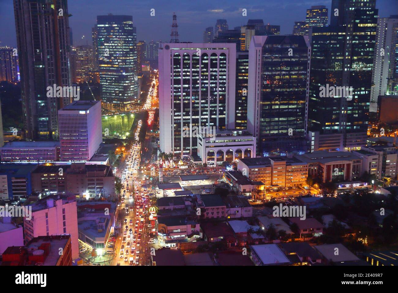 MANILA, PHILIPPINES - DECEMBER 7, 2017: Typical traffic congestion in Poblacion Makati, Philippines. Metro Manila is one of the biggest urban areas in Stock Photo