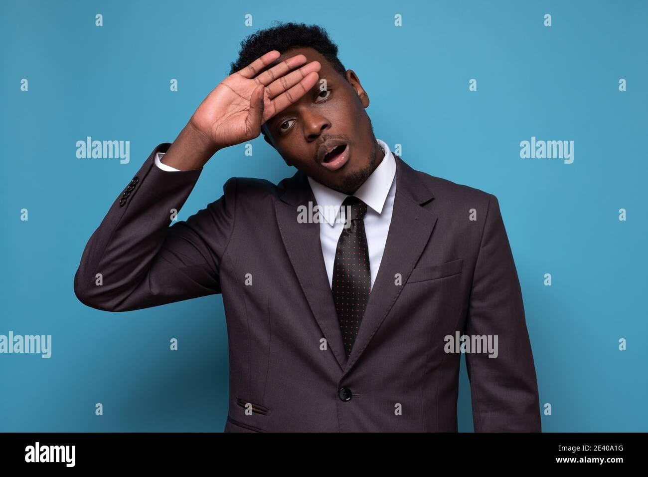 African Businessman Being Tired After Hard Working Day Wiping Sweat From Head Studio Shot Stock Photo Alamy African Businessman Being Tired After Hard Working Day Wiping Sweat From Head Studio Shot Stock Photo Alamy