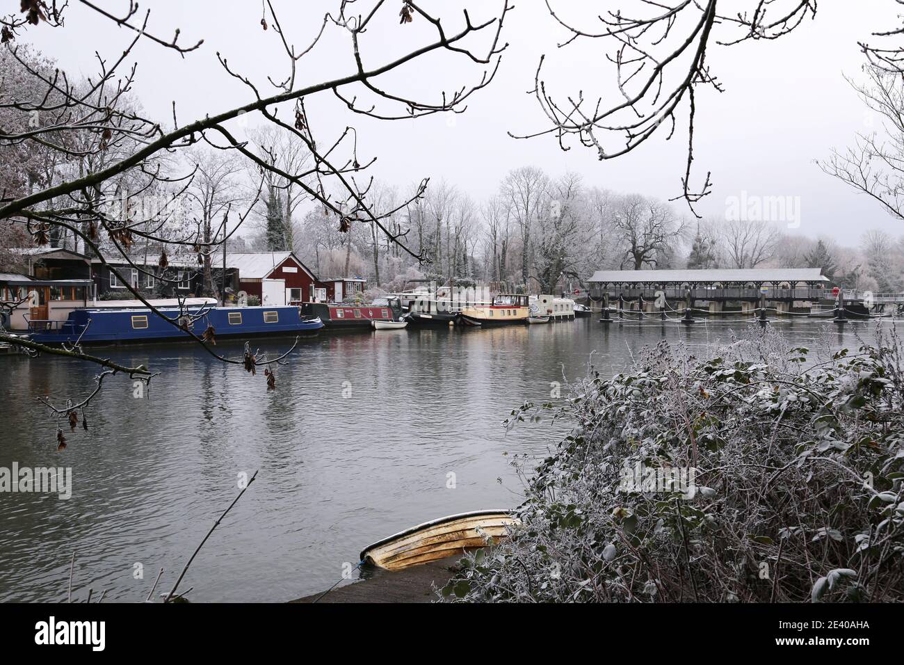 T W Allen boatyard and Molesey Weir on a frosty morning, Hampton Court, East Molesey, Surrey, England, Great Britain, United Kingdom, UK, Europe Stock Photo