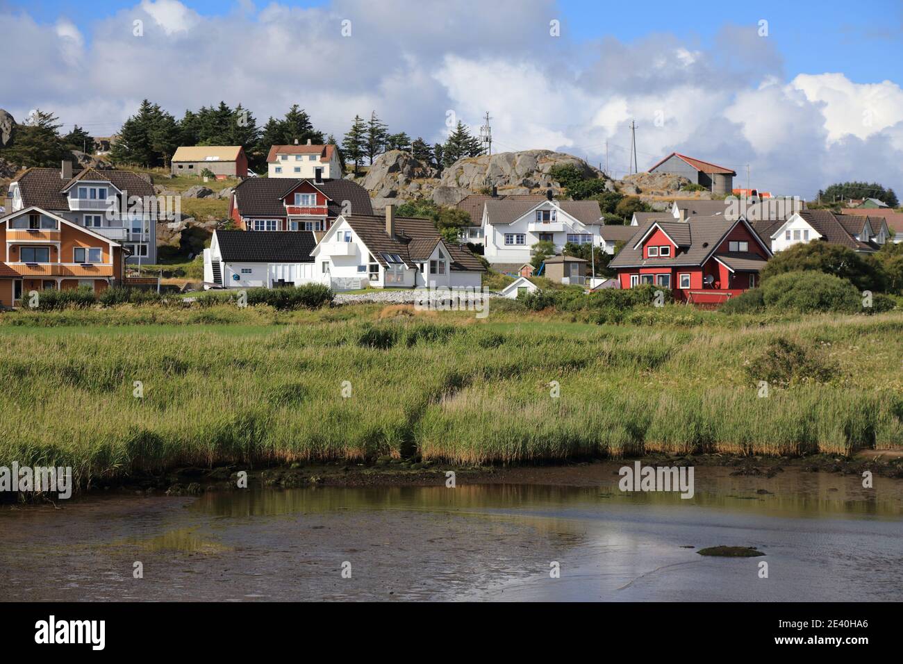 Norway colorful wooden houses of Karmoy island. Akhrehamn fishing town in Norway. Stock Photo