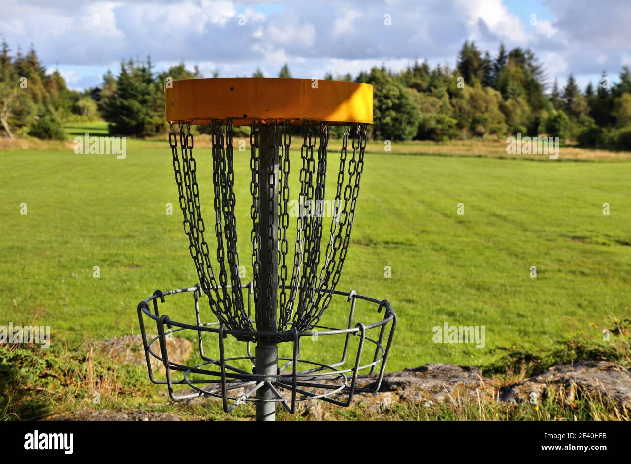 Disc golf course basket in Norway. Rare outdoor sport Stock Photo Alamy