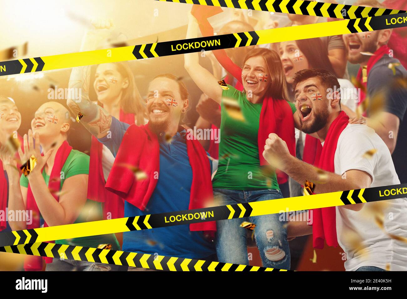 Cancellation. Soccer, football fans women and men cheering for favourite sport team with bright emotions behind the limiting tapes with Lockdown. Look excited, supporting, wondered. Blocked social life. Stock Photo