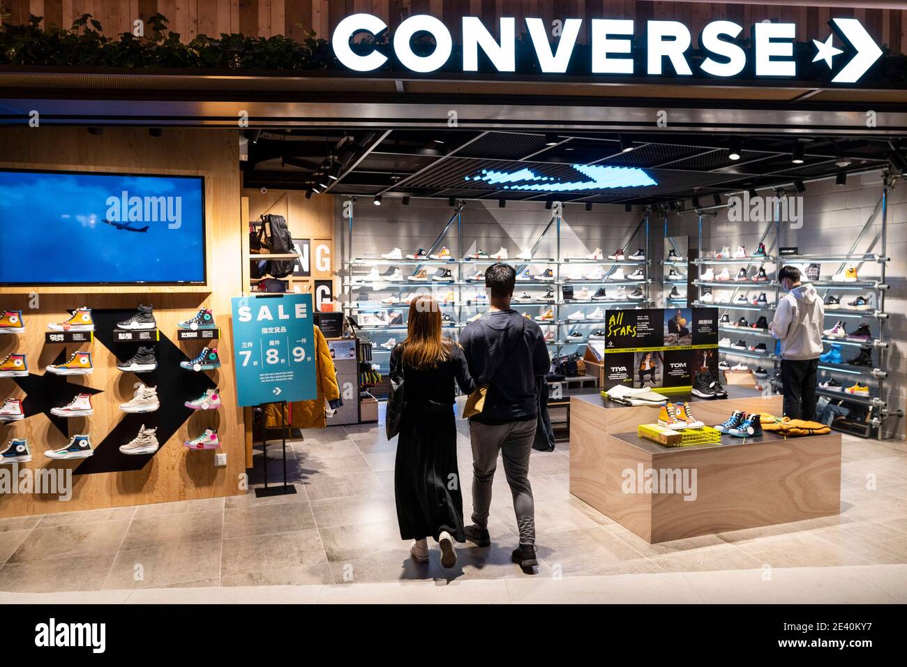 January 16, 2021, Hong Kong, China: A couple walks in the American shoe  brand company Converse store seen in Hong Kong. (Credit Image: © Budrul  Chukrut/SOPA Images via ZUMA Wire Stock Photo - Alamy