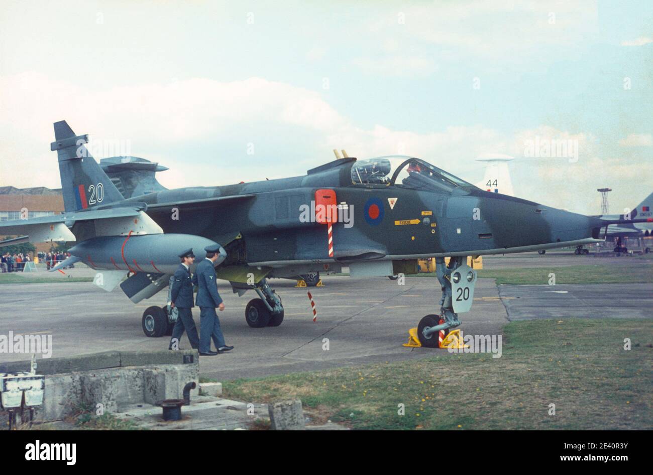 1975 RAF Finningley air display airshow 1975 Two RAF servicemen walking towards the Jaguar XX748 on static display . This Jaguar GR1 is coded '20' of 226 OCU Lossiemouth.The photo is taken 20 Sep 1975 at an air show at  RAF Finningley airfield Doncaster South Yorkshire England UK GB Europe Stock Photo