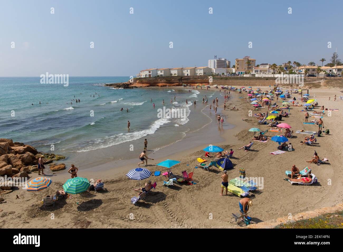 Playa Flamenca Alicante Spain beautiful beach with holidaymakers in