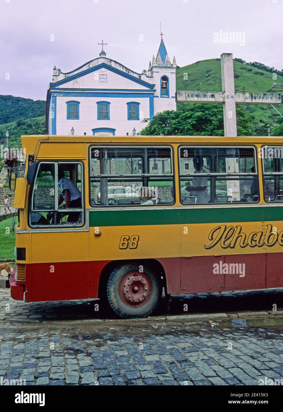 bus in front of the church Nossa Senora de Ajuda in Ilhabela, Sao Paulo state, Brazil Stock Photo