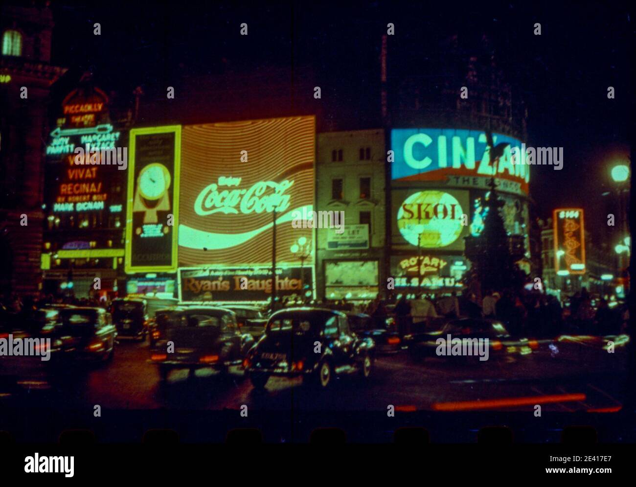 The neon lights of London's Piccadilly Circus at night in 1970 Stock Photo