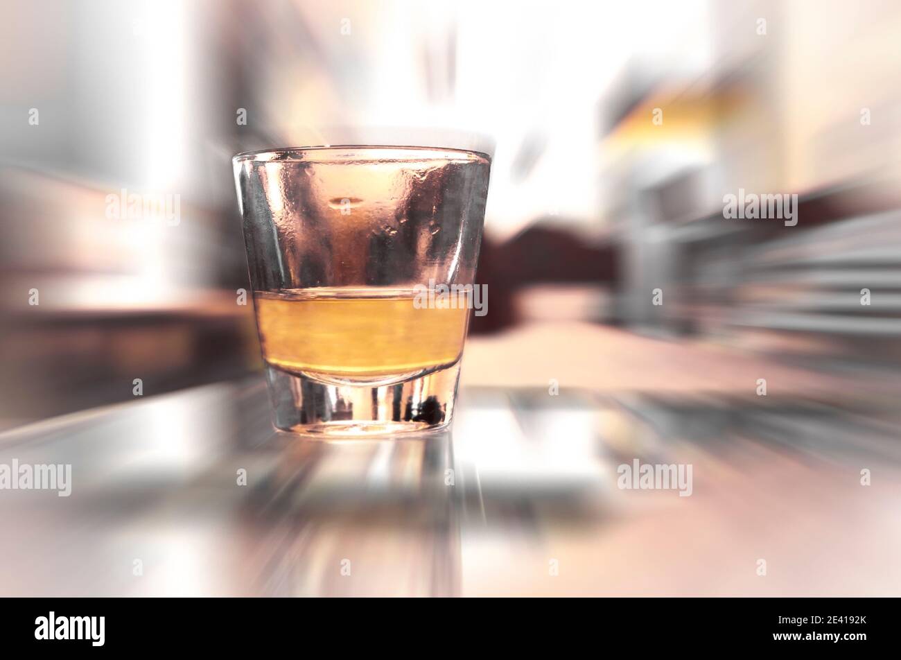 Rakomelo is a Greek alcoholic drink made from honey by the process of fermenting sugar sugars. Stock Photo