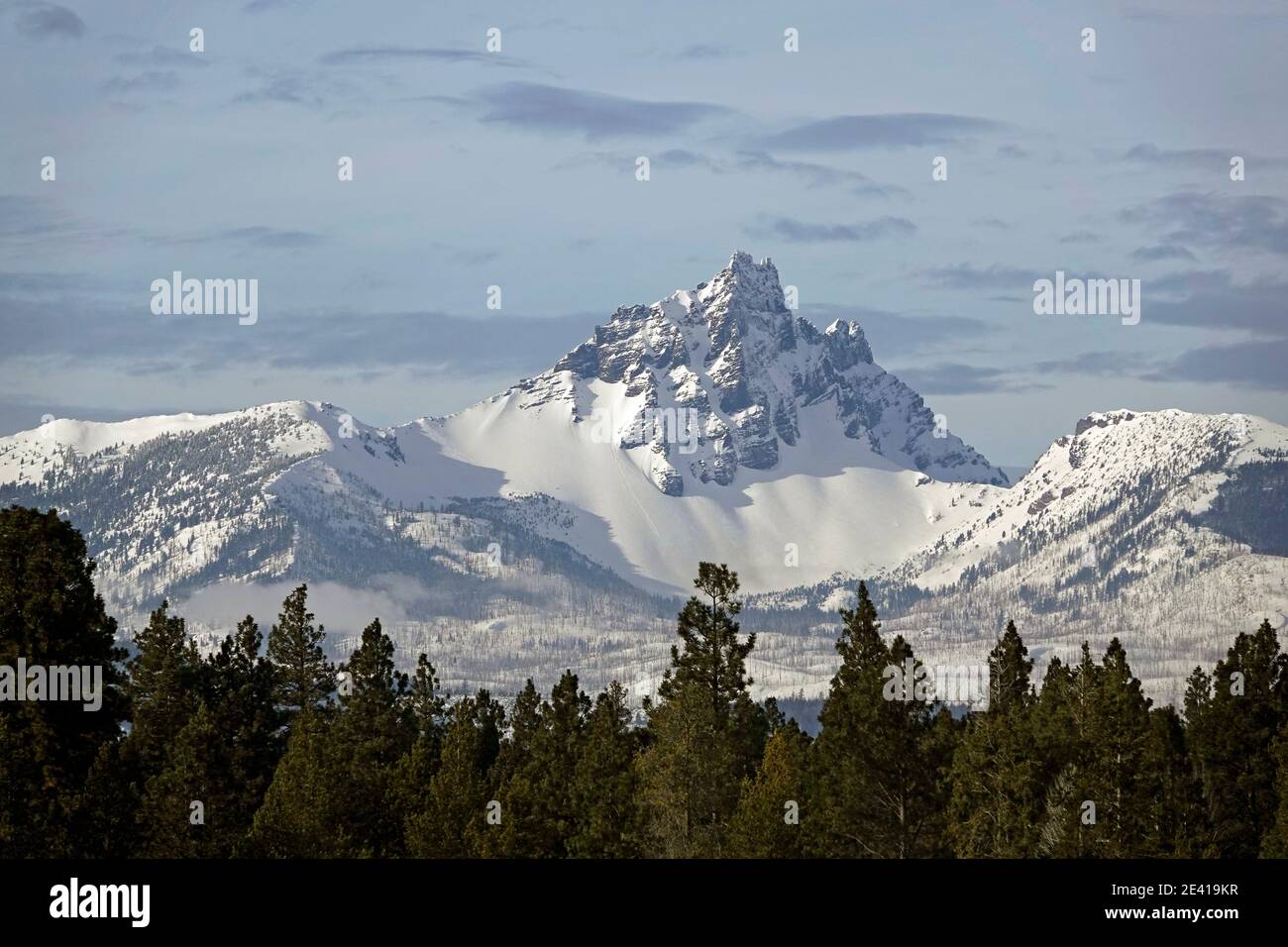 A view of Three-Fingered Jack peak in the Oregon Cascade Mountains, in winter. Stock Photo