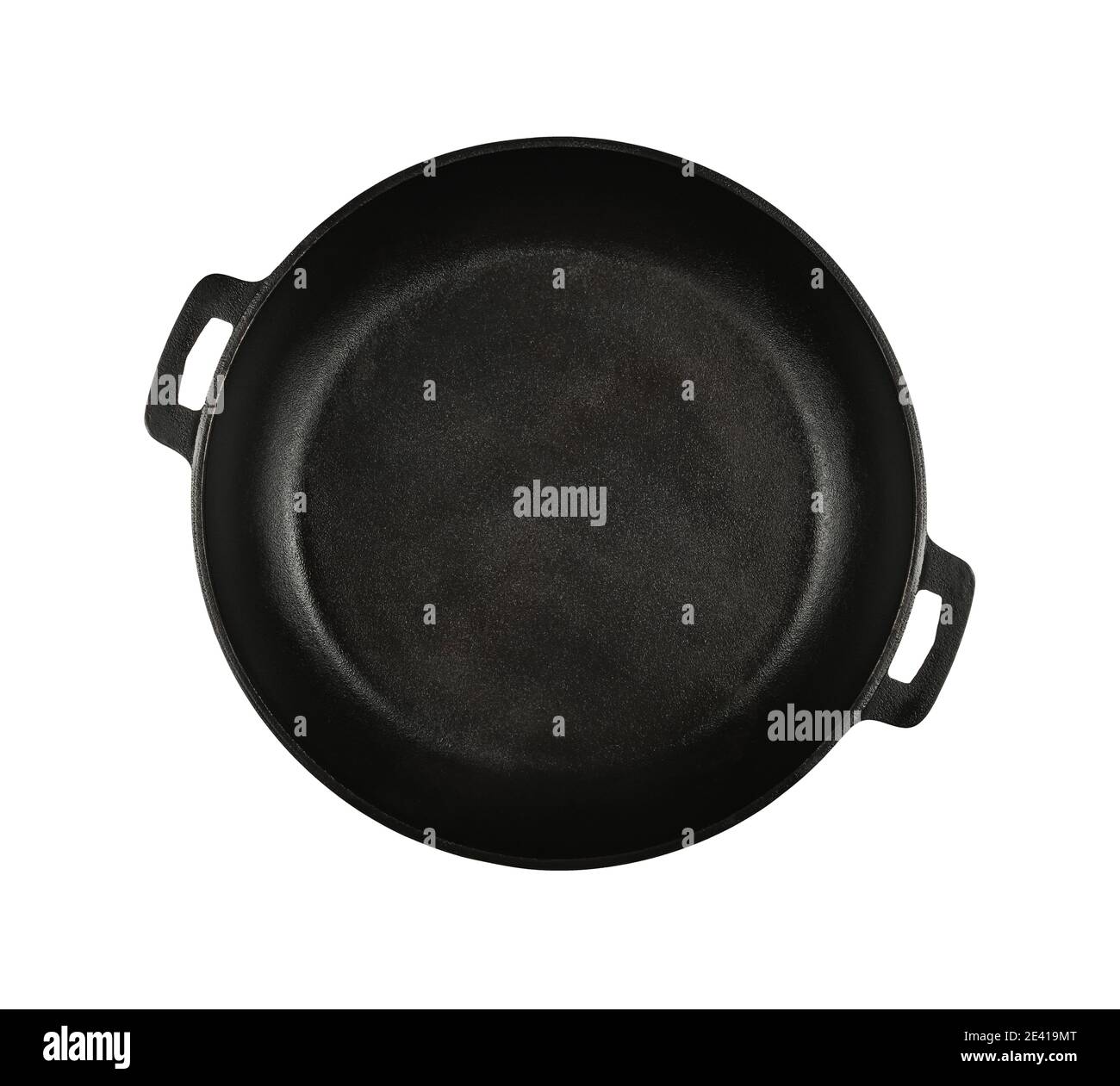 Close up one empty black cast iron frying pan isolated on white