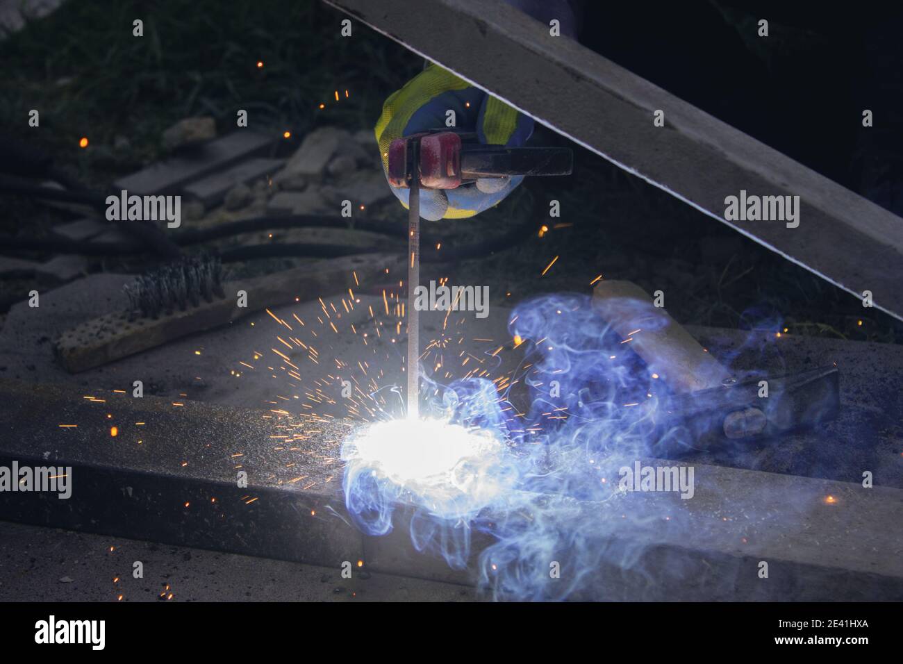 young foreman doing electrical welding Stock Photo Alamy