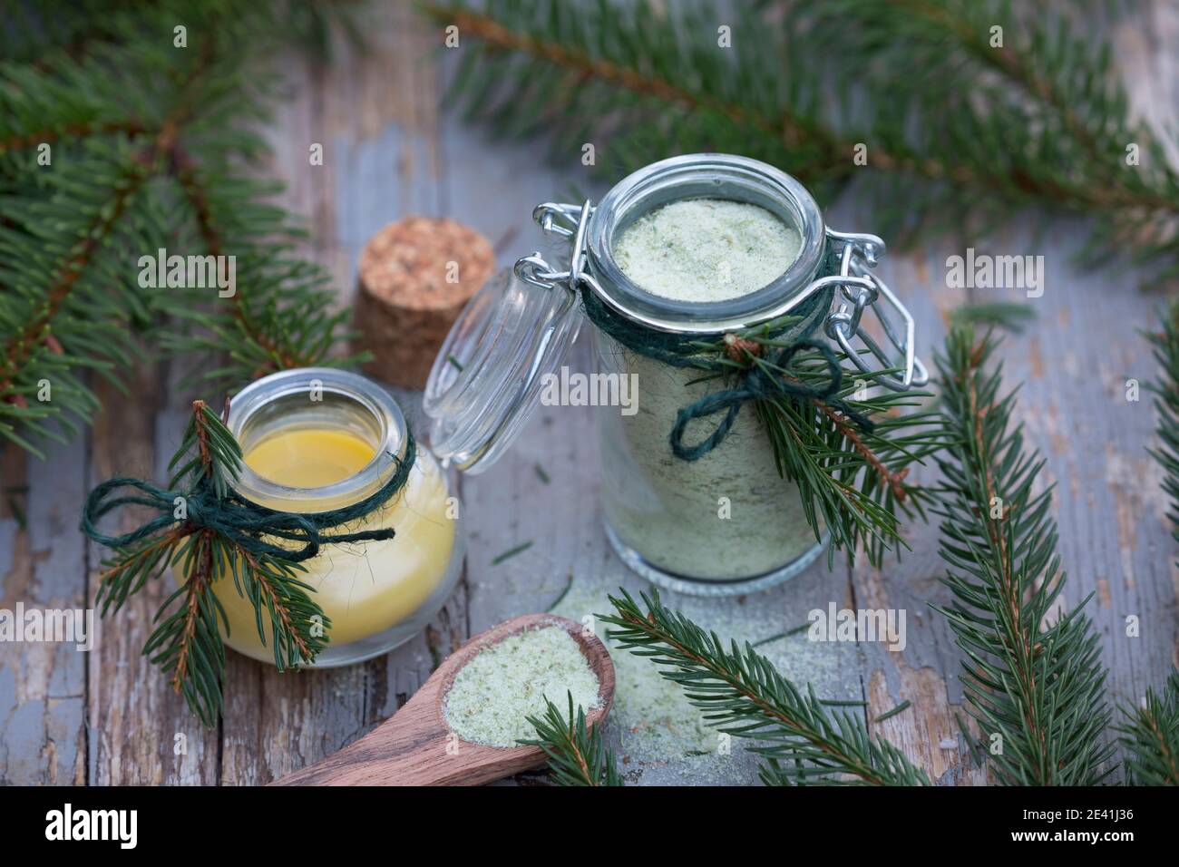 Norway spruce (Picea abies), selfmade products with spruce needles, spruce salt and creme, made of olive oil and beeswax, Germany Stock Photo