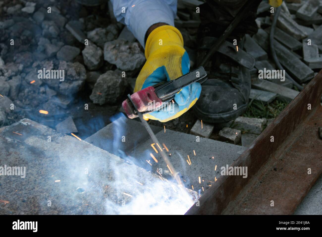 young foreman doing electrical welding Stock Photo Alamy