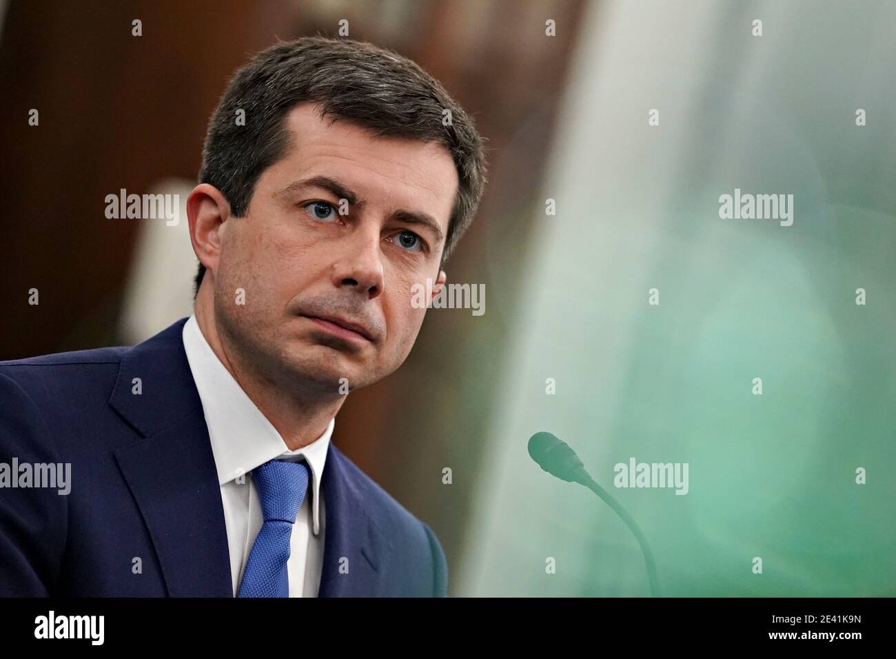 Washington, DC, USA. 21st Jan, 2021. Pete Buttigieg, U.S. secretary of transportation nominee for U.S. President Joe Biden, listens during a Senate Commerce, Science and Transportation Committee confirmation hearing in Washington, DC, U.S., on Thursday, Jan. 21, 2021. Buttigieg, is pledging to carry out the administration's ambitious agenda to rebuild the nation's infrastructure, calling it a 'generational opportunity' to create new jobs, fight economic inequality and stem climate change.Credit: Stefani Reynolds/Pool via CNP | usage worldwide Credit: dpa/Alamy Live News Stock Photo