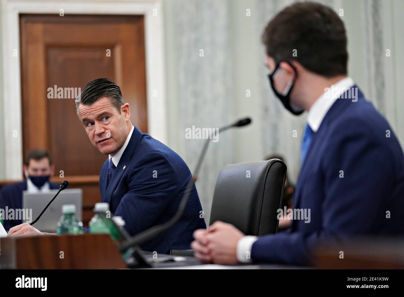 United States Senator Todd Young (Republican of Indiana), introduces Pete Buttigieg, U.S. secretary of transportation nominee for U.S. President Joe Biden, right, during a Senate Commerce, Science and Transportation Committee confirmation hearing in Washington, DC, U.S., on Thursday, Jan. 21, 2021. Buttigieg, is pledging to carry out the administration's ambitious agenda to rebuild the nation's infrastructure, calling it a 'generational opportunity' to create new jobs, fight economic inequality and stem climate change. Credit: Stefani Reynolds/Pool via CNP | usage worldwide Stock Photo