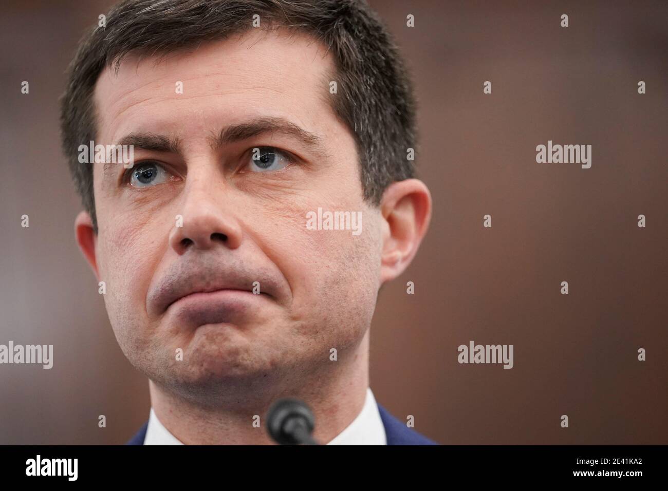 Washington, DC, USA. 21st Jan, 2021. Pete Buttigieg, U.S. secretary of transportation nominee for U.S. President Joe Biden, pauses during a Senate Commerce, Science and Transportation Committee confirmation hearing in Washington, DC, U.S., on Thursday, Jan. 21, 2021. Buttigieg, is pledging to carry out the administration's ambitious agenda to rebuild the nation's infrastructure, calling it a 'generational opportunity' to create new jobs, fight economic inequality and stem climate change. Credit: Stefani Reynolds/Pool via CNP | usage worldwide Credit: dpa/Alamy Live News Stock Photo