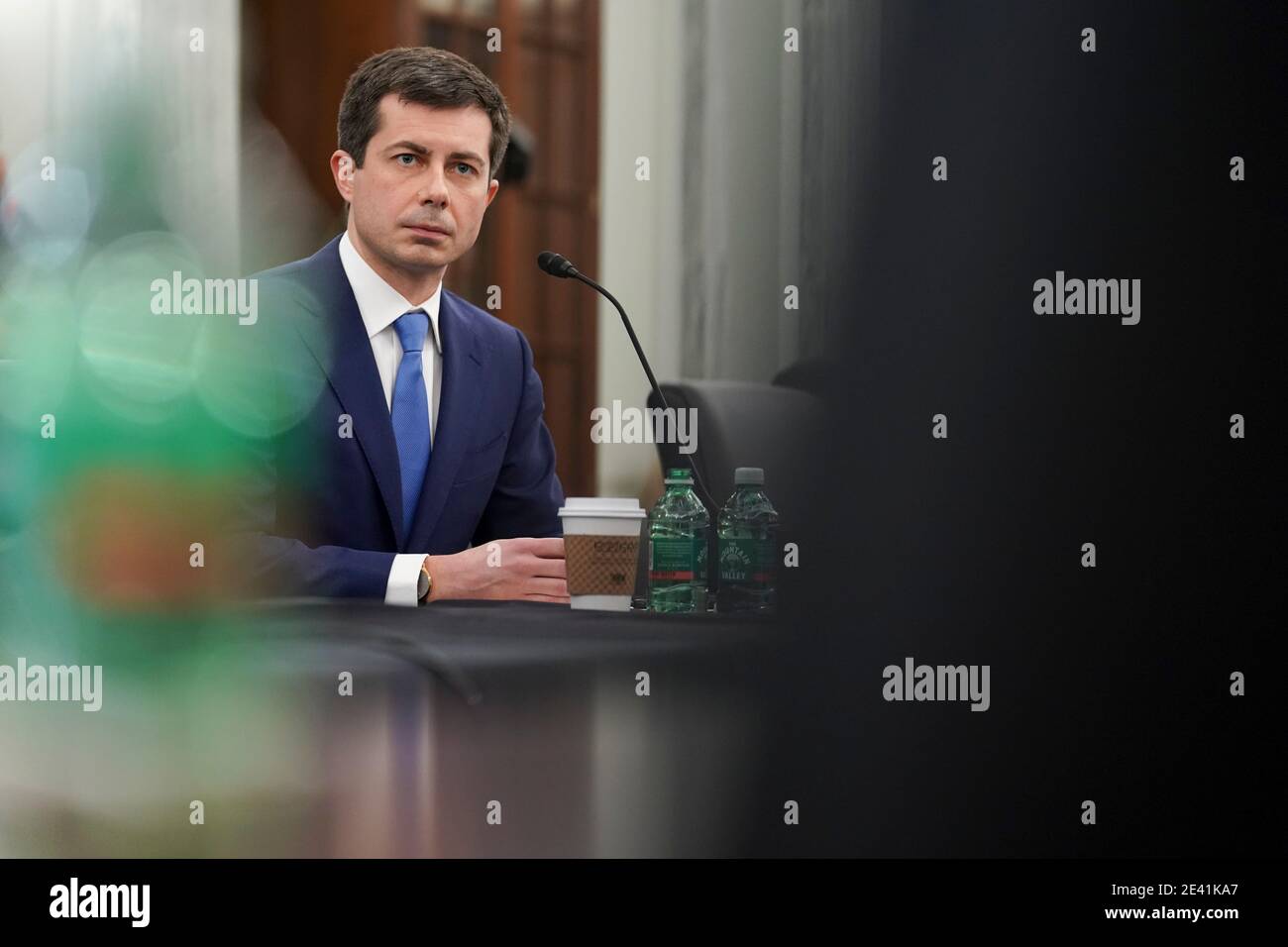 Washington, DC, USA. 21st Jan, 2021. Pete Buttigieg, U.S. secretary of transportation nominee for U.S. President Joe Biden, listens during a Senate Commerce, Science and Transportation Committee confirmation hearing in Washington, DC, U.S., on Thursday, Jan. 21, 2021. Buttigieg, is pledging to carry out the administration's ambitious agenda to rebuild the nation's infrastructure, calling it a 'generational opportunity' to create new jobs, fight economic inequality and stem climate change. Credit: Stefani Reynolds/Pool via CNP | usage worldwide Credit: dpa/Alamy Live News Stock Photo
