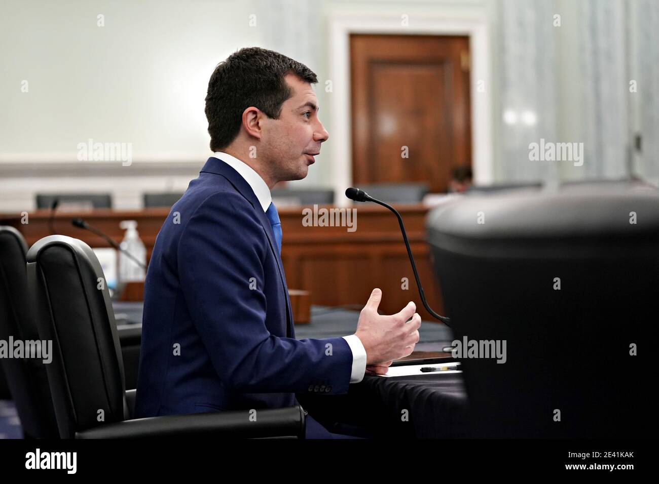 Washington, DC, USA. 21st Jan, 2021. Pete Buttigieg, U.S. secretary of transportation nominee for U.S. President Joe Biden, speaks during a Senate Commerce, Science and Transportation Committee confirmation hearing in Washington, DC, U.S., on Thursday, Jan. 21, 2021. Buttigieg, is pledging to carry out the administration's ambitious agenda to rebuild the nation's infrastructure, calling it a 'generational opportunity' to create new jobs, fight economic inequality and stem climate change. Credit: Stefani Reynolds/Pool via CNP | usage worldwide Credit: dpa/Alamy Live News Stock Photo