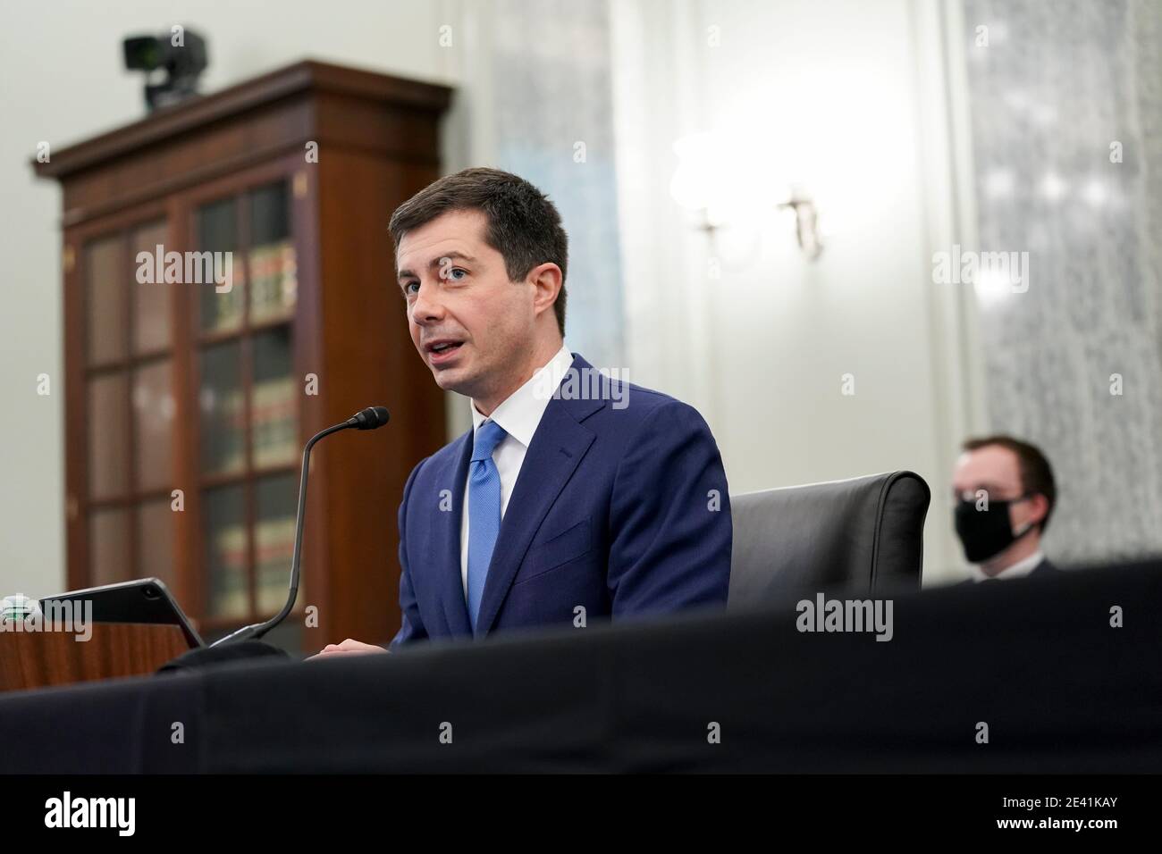 Washington, DC, USA. 21st Jan, 2021. Pete Buttigieg, U.S. secretary of transportation nominee for U.S. President Joe Biden, speaks during a Senate Commerce, Science and Transportation Committee confirmation hearing in Washington, DC, U.S., on Thursday, Jan. 21, 2021. Buttigieg, is pledging to carry out the administration's ambitious agenda to rebuild the nation's infrastructure, calling it a 'generational opportunity' to create new jobs, fight economic inequality and stem climate change.Credit: Stefani Reynolds/Pool via CNP | usage worldwide Credit: dpa/Alamy Live News Stock Photo