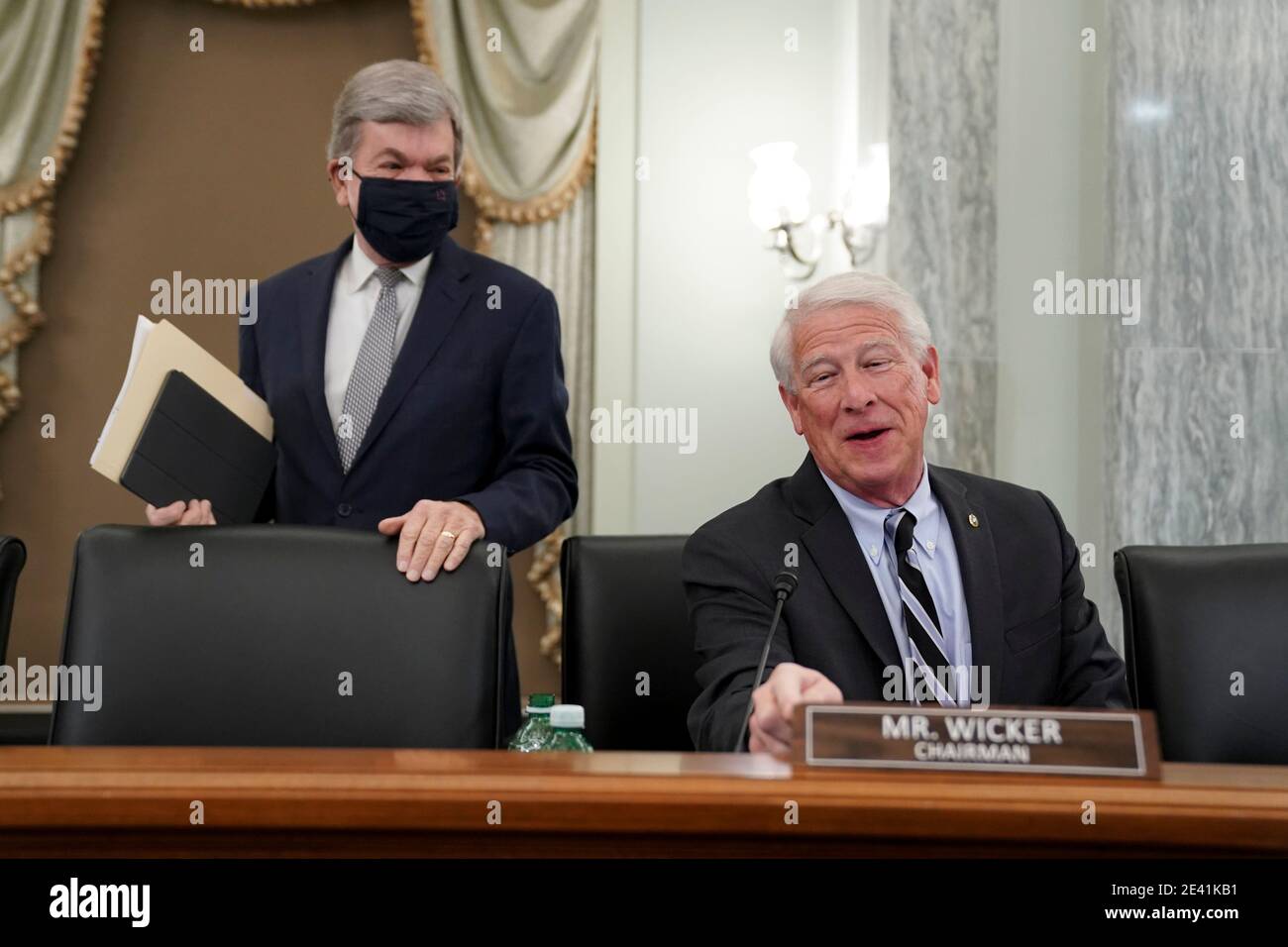 United States Senator Roger Wicker (Republican of Mississippi), Chairman, US Senate Committee on Commerce, Science, & Transportation, right, and Senator Roy Blunt, a Republican from Missouri, arrive to a confirmation hearing for U.S. Secretary of Transportation nominee Pete Buttigieg in Washington, DC, U.S., on Thursday, Jan. 21, 2021. Buttigieg, is pledging to carry out the administration's ambitious agenda to rebuild the nation's infrastructure, calling it a 'generational opportunity' to create new jobs, fight economic inequality and stem climate change. Credit: Stefani Reynolds/Pool via Stock Photo