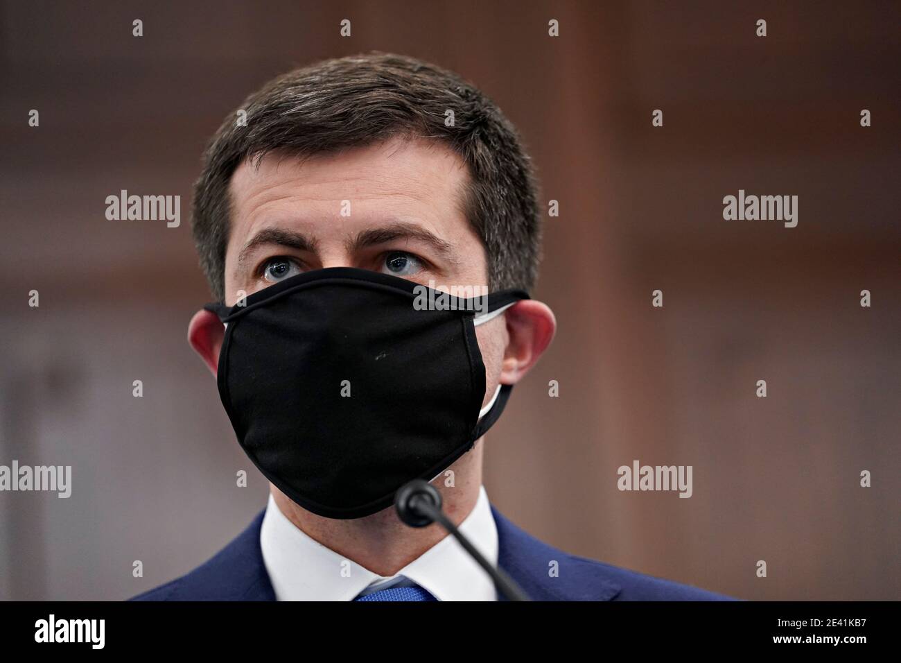 Washington, DC, USA. 21st Jan, 2021. Pete Buttigieg, U.S. secretary of transportation nominee for U.S. President Joe Biden, wears a protective mask during a Senate Commerce, Science and Transportation Committee confirmation hearing in Washington, DC, U.S., on Thursday, Jan. 21, 2021. Buttigieg, is pledging to carry out the administration's ambitious agenda to rebuild the nation's infrastructure, calling it a 'generational opportunity' to create new jobs, fight economic inequality and stem climate change. Credit: Stefani Reynolds/Pool via CNP | usage worldwide Credit: dpa/Alamy Live News Stock Photo