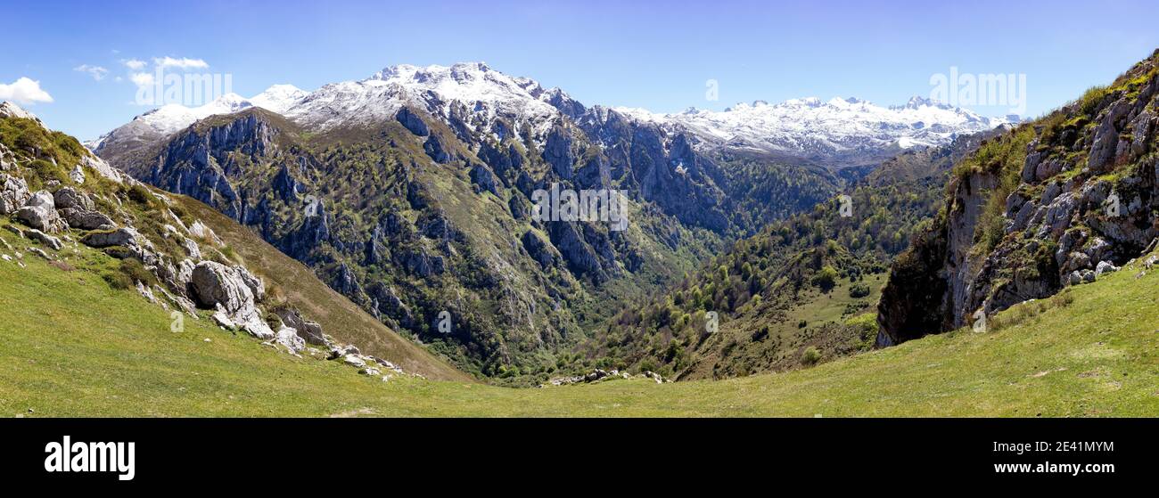 Panorama of the jagged Collau los Buitres from the high alp of Pandescura in the Picos de Europa mountains of northern Spain near Bobia Stock Photo