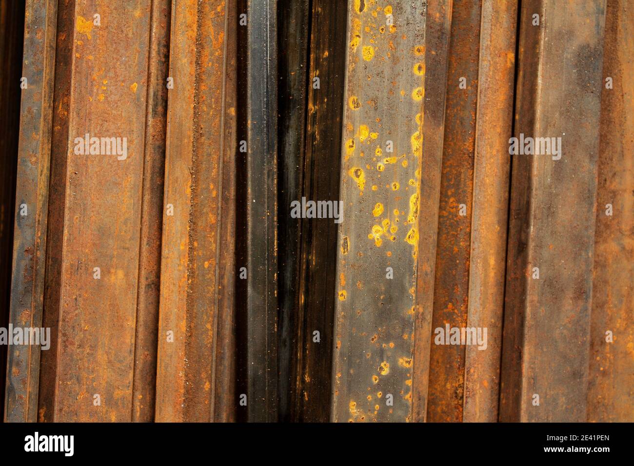 Vertical line pattern from metal rusted flat bars for background Stock Photo