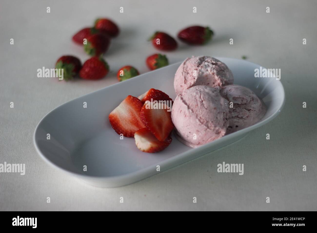 Eggless Strawberry ice cream with fresh strawberries, heavy cream and