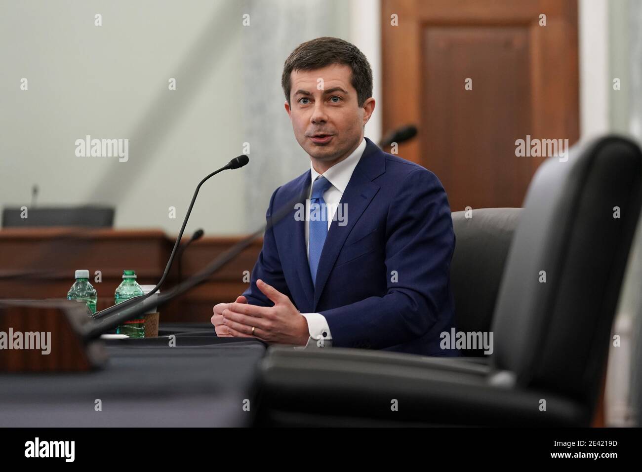 Pete Buttigieg, U.S. secretary of transportation nominee for U.S. President Joe Biden, speaks during a Senate Commerce, Science and Transportation Committee confirmation hearing in Washington, DC, U.S., on Thursday, Jan. 21, 2021. Buttigieg, is pledging to carry out the administration's ambitious agenda to rebuild the nation's infrastructure, calling it a 'generational opportunity' to create new jobs, fight economic inequality and stem climate change. Credit: Stefani Reynolds/Pool via CNP /MediaPunch Stock Photo