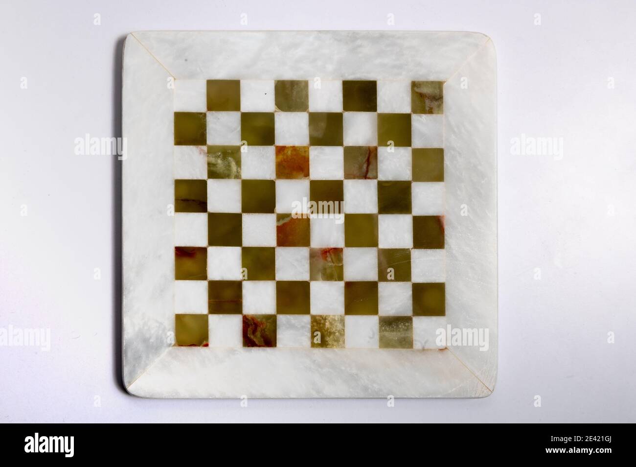 White marble chess board. Marble chess pattern on background. Stock Photo