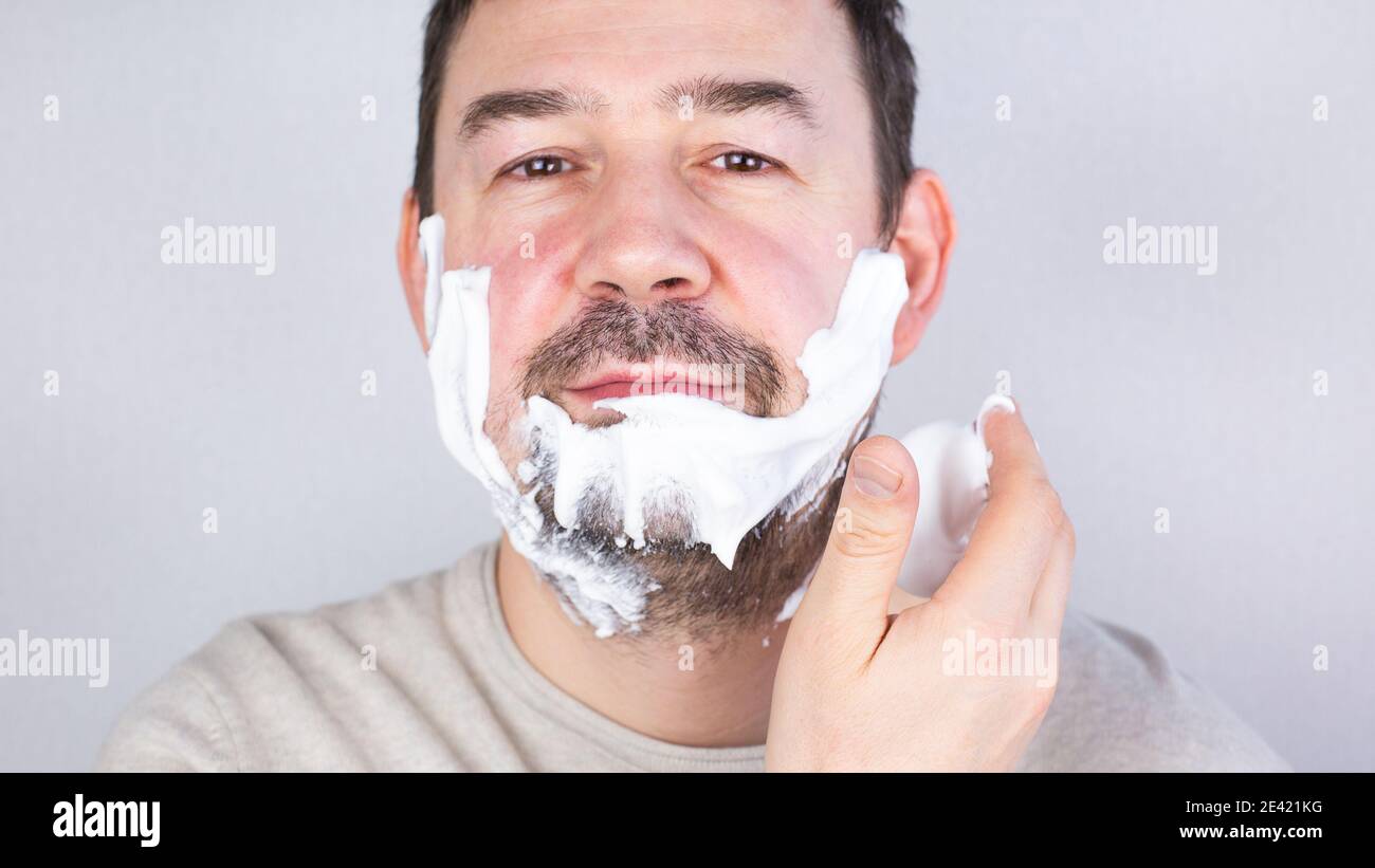 Man shaving foam on face hires stock photography and images Alamy
