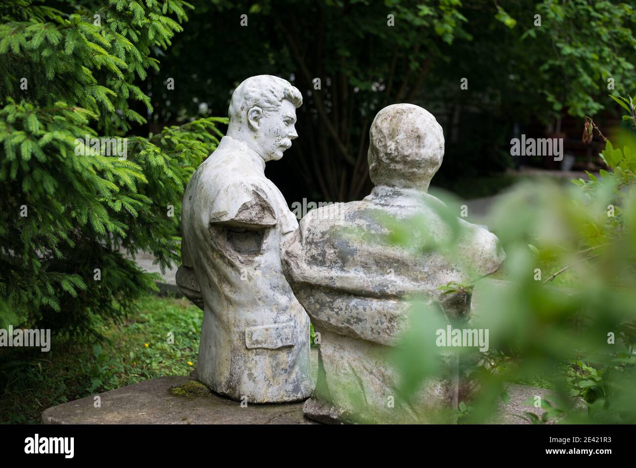 Broken sculpture of the Soviet period of party functionaries Lenin and Stalin Stock Photo