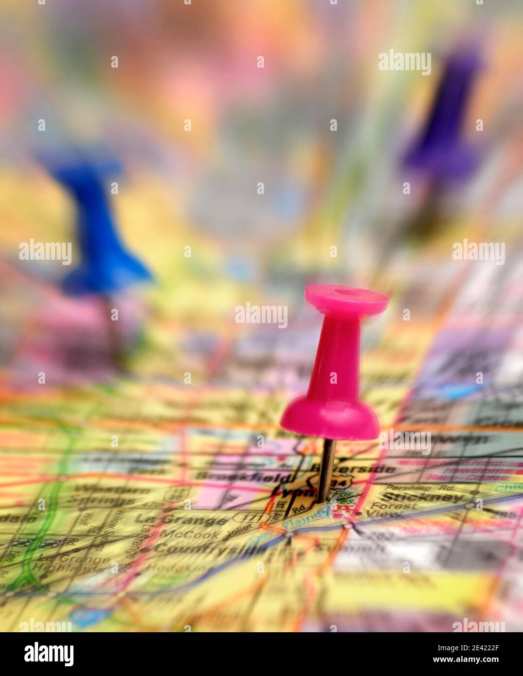 Map with thumb tacks showing locations zooming action to destinations Stock Photo Alamy