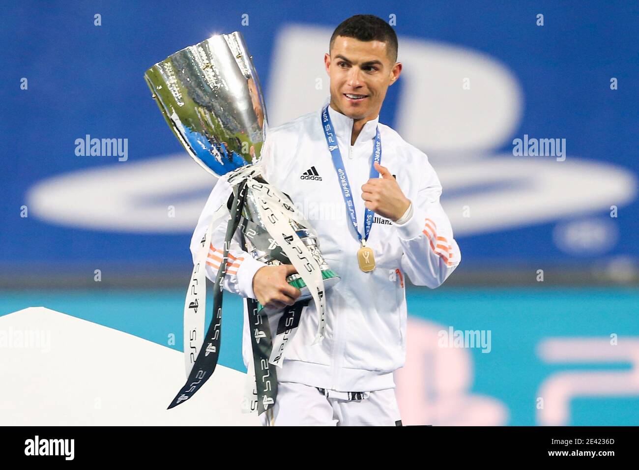 Juventus's Portuguese striker Cristiano Ronaldo exults with the cup in his  hand during the italian supercup named PS5 Supercup football match SSC  Napoli vs Juventus FC. Juventus won 2-0 Stock Photo - Alamy
