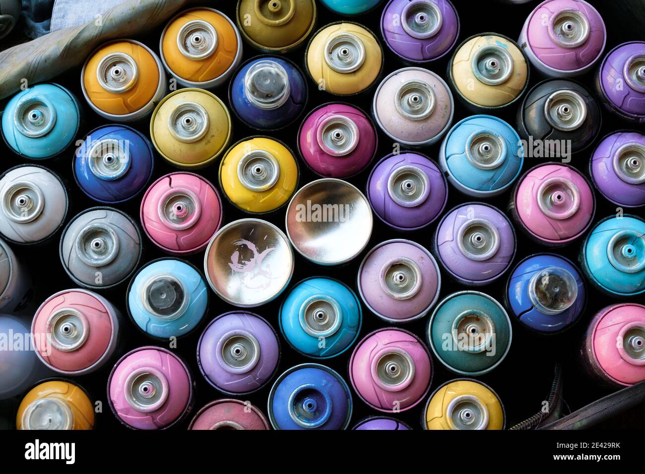 Used cans of spray paint in a bag Stock Photo