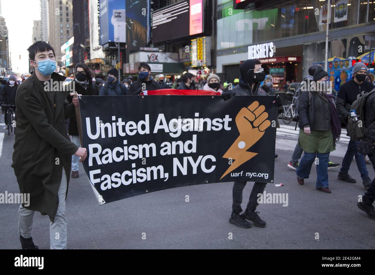 Marcher head down 7th Avenue speaking out against Donald Trump and the Capital Insurrection with many avowed Socialists and anti-Fascists among them i Stock Photo