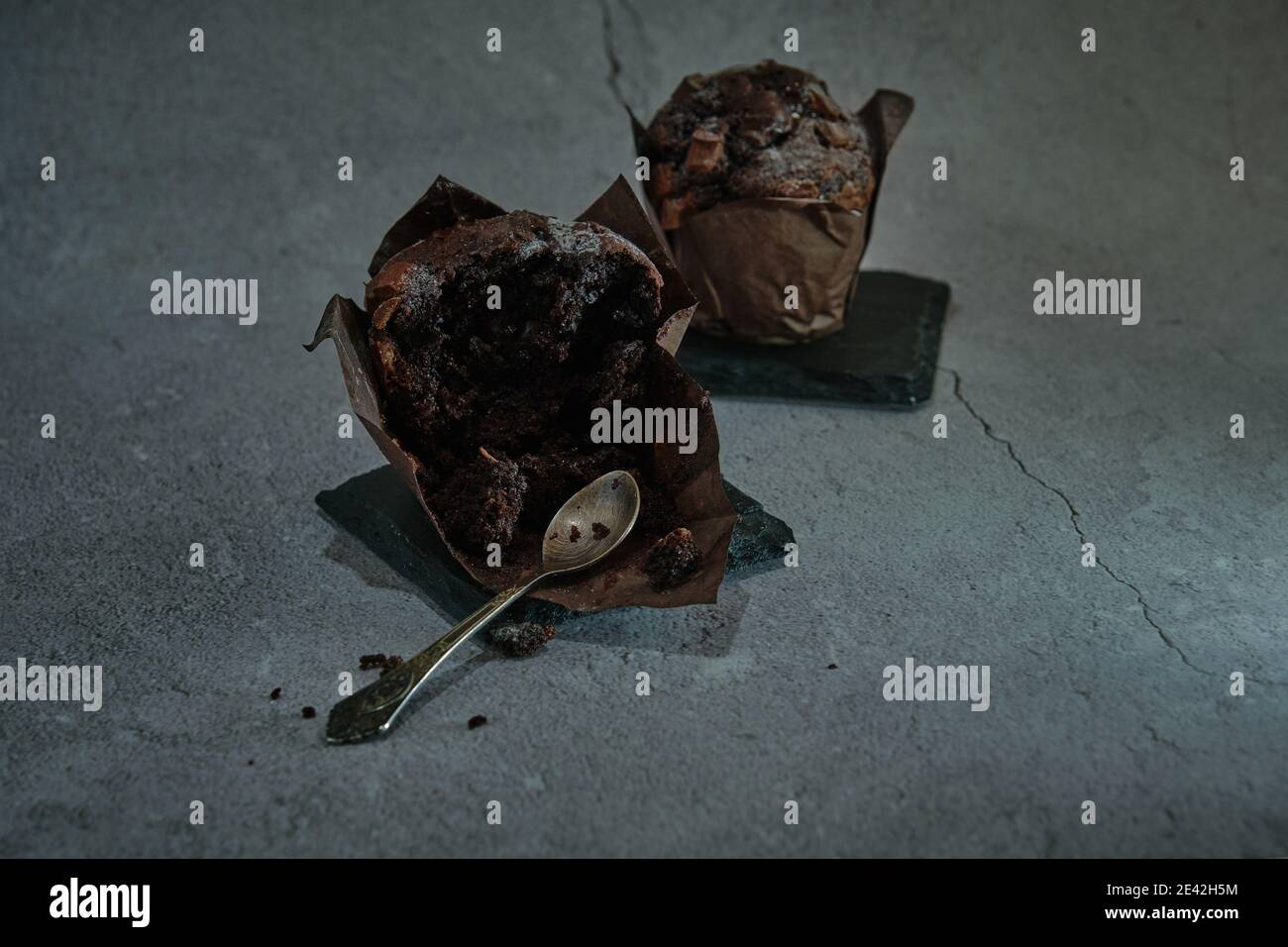 chocolate muffins on a dark background Stock Photo