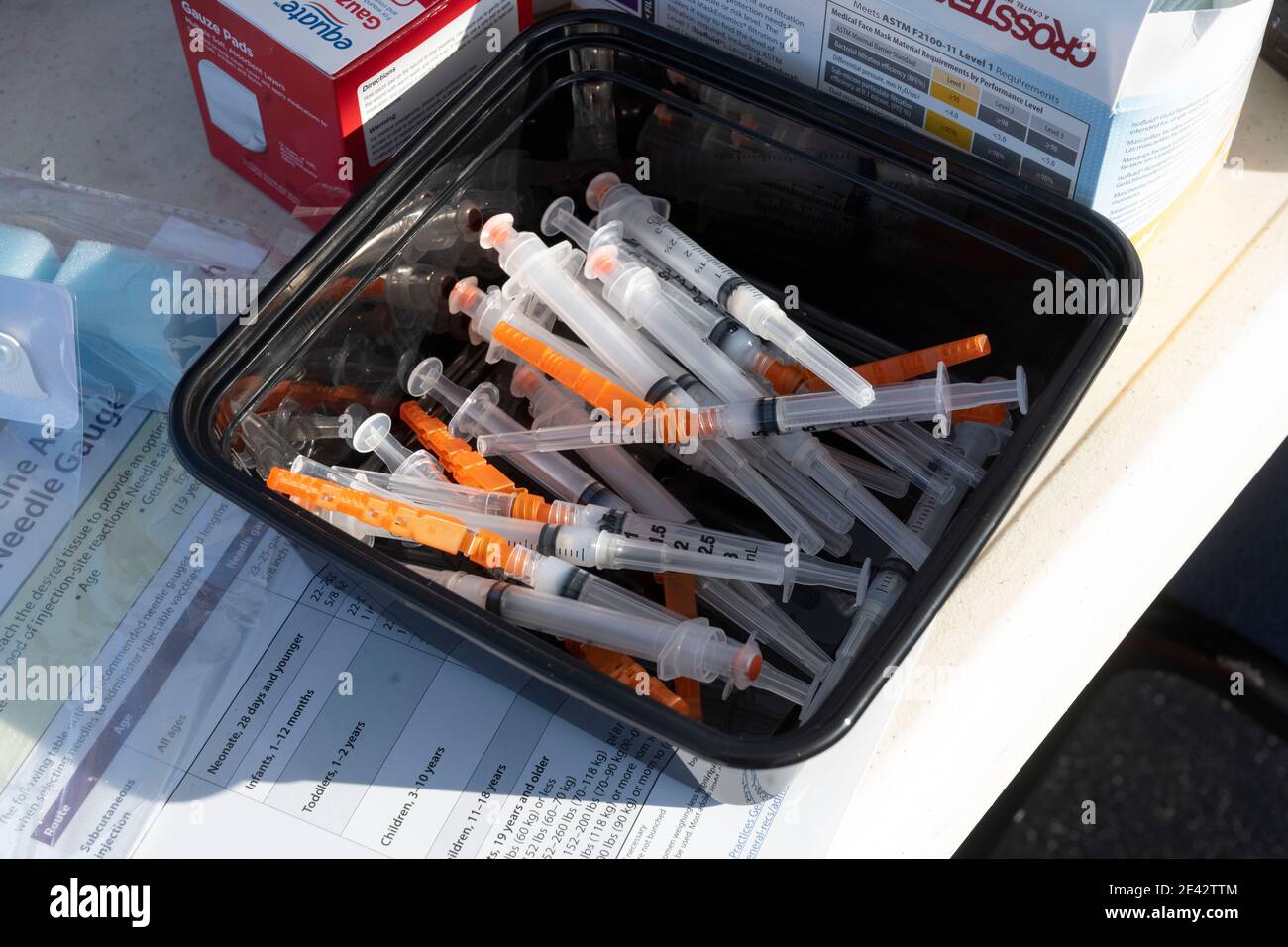 Round Rock, USA. 21st Jan, 2021: Syringes loaded with the Moderna COVID-19 vaccine sit ready to be administered at a Central Texans drive-through clinic at Kelly Athletic Stadium in Round Rock. Credit: Bob Daemmrich/Alamy Live News Stock Photo