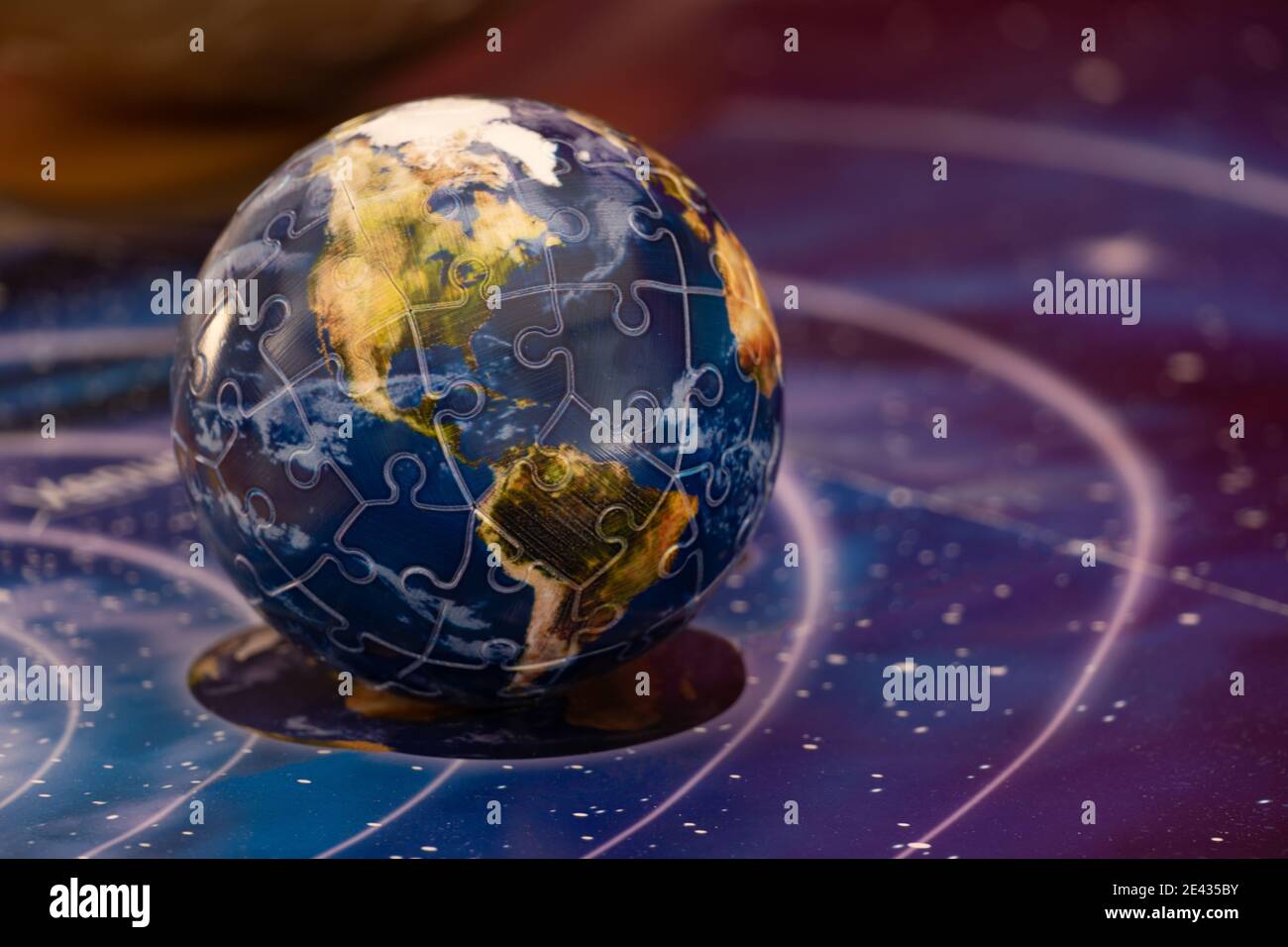 Planet earth orbiting in the galaxy Stock Photo