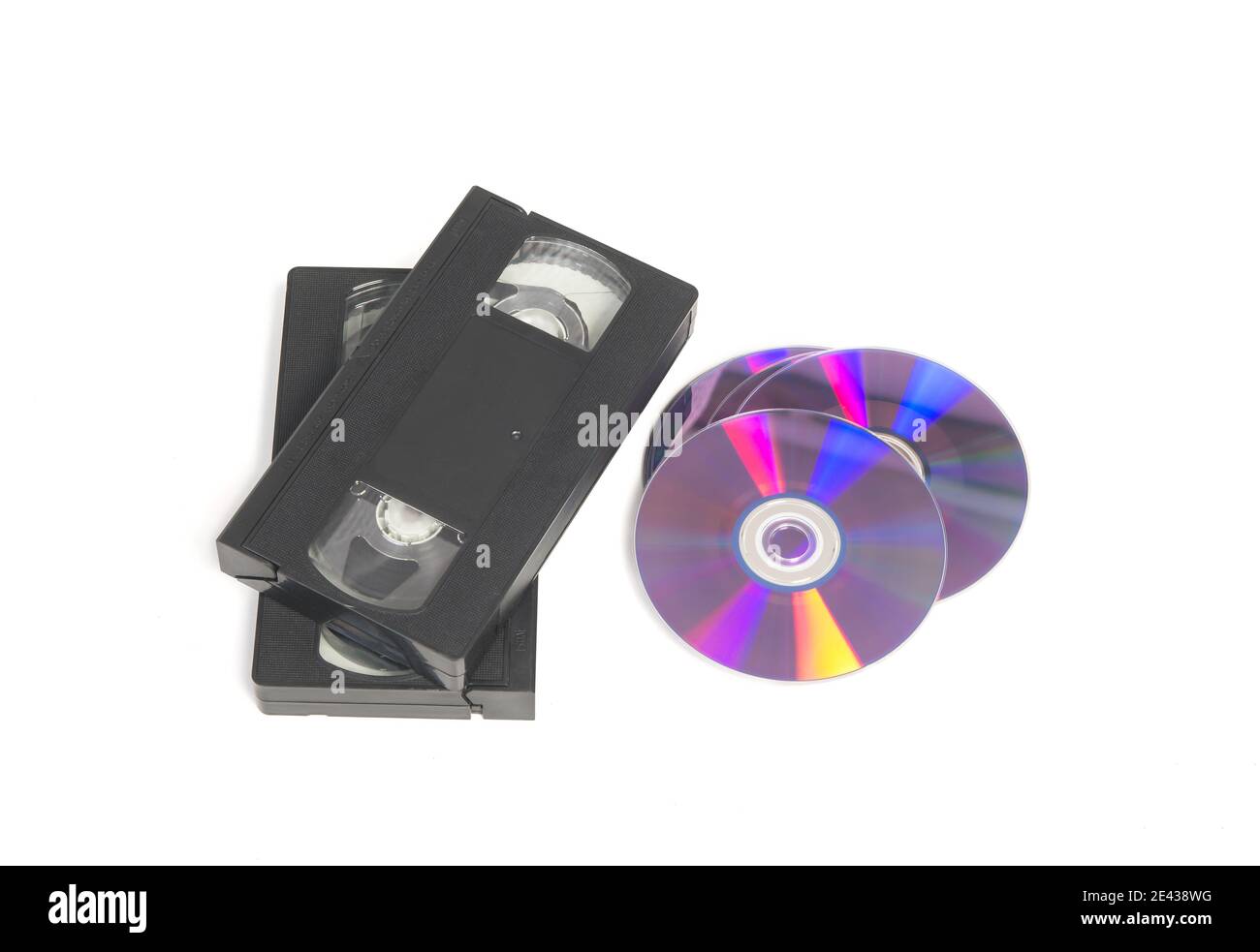 Video tapes and cd or dvd discs isolated on white background. Stock Photo
