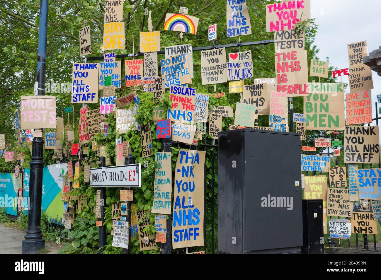 Thank you NHS sign paintings hang on fence in London park in roman road, England Stock Photo