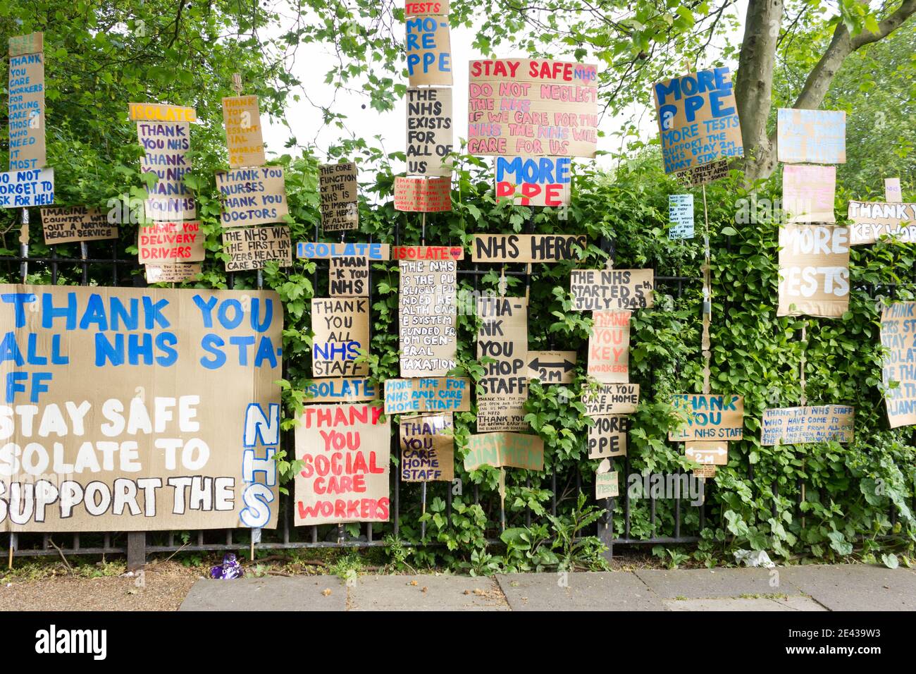 Thank you NHS sign paintings hang on fence in London park in roman road Stock Photo